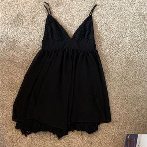 Black spaghetti strap dress.